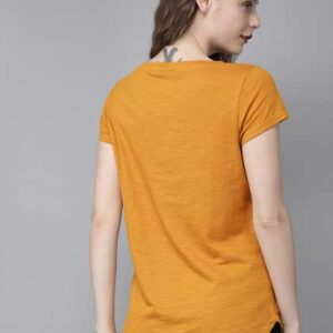 roadster women mustard yellow solid round neck pur